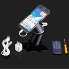 COMER Anti-Theft Cell Phone Holder stand for Apple and Android with alarm sensor charger cord